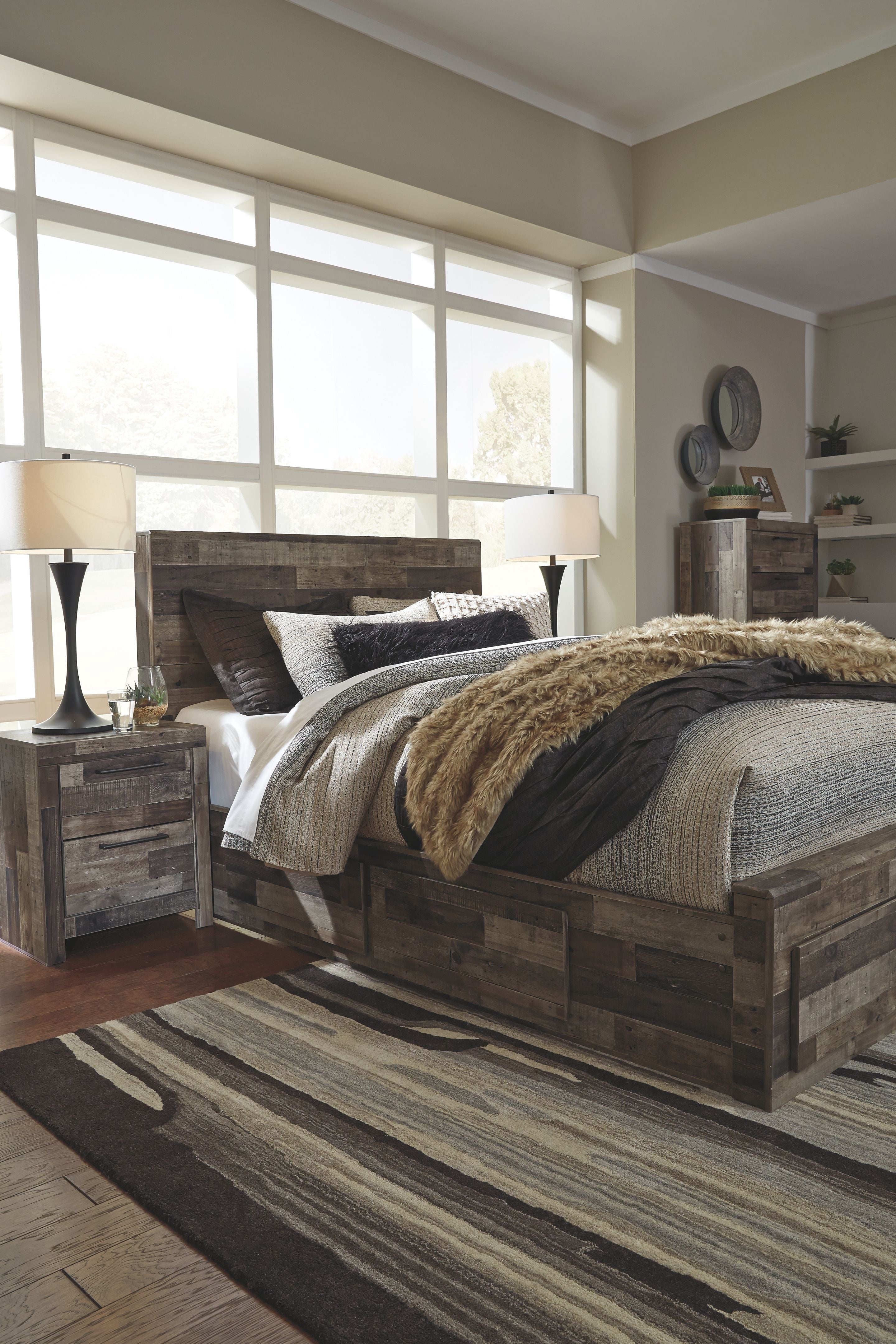 Panel bedroom bed with dark wood frame and striped bedding
