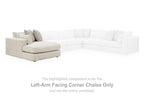 Left-arm facing corner chaise section with light fabric cushions and multiple back pillows