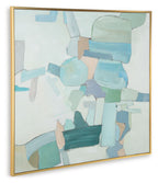 Abstract wall art in a gold frame with teal and light blue layered shapes