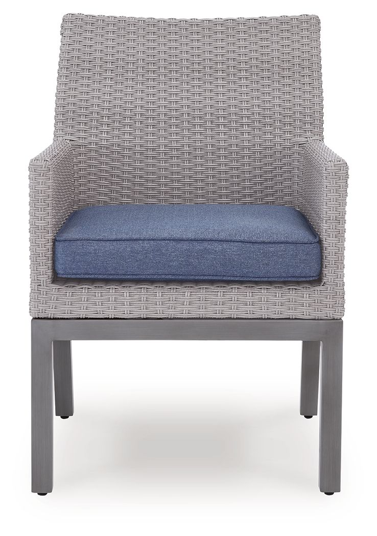 Gray woven armchair with blue cushion, open arms, straight legs
