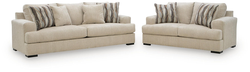Oatmeal fabric sofa and loveseat set with striped throw pillows
