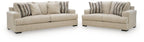 Oatmeal fabric sofa and loveseat set with striped throw pillows