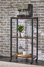 Black metal bar cart with brown shelves, casters, and drinkware on top