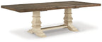 Brown wood dining table with beige turned legs and apron