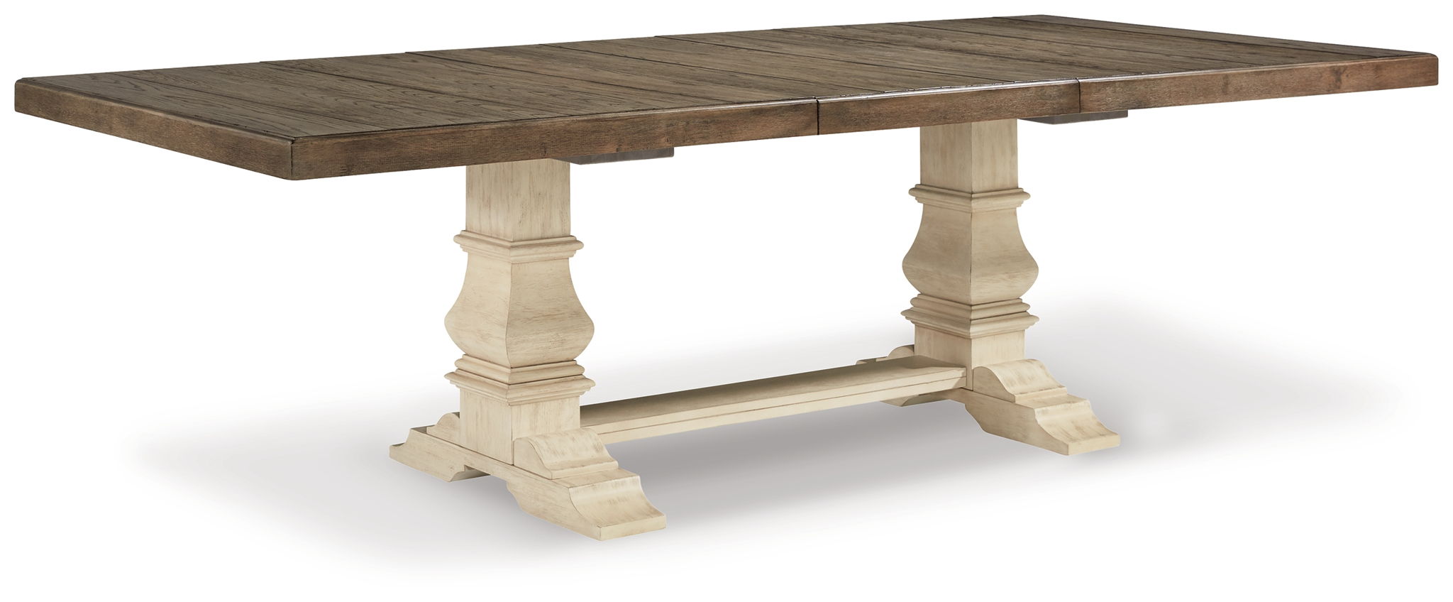 Brown wood dining table with beige turned legs and apron