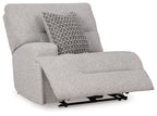 Pewter gray power recliner with patterned pillow and extended footrest