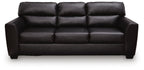 Glennbre queen sofa sleeper with tufted seat cushions and dark backrest.