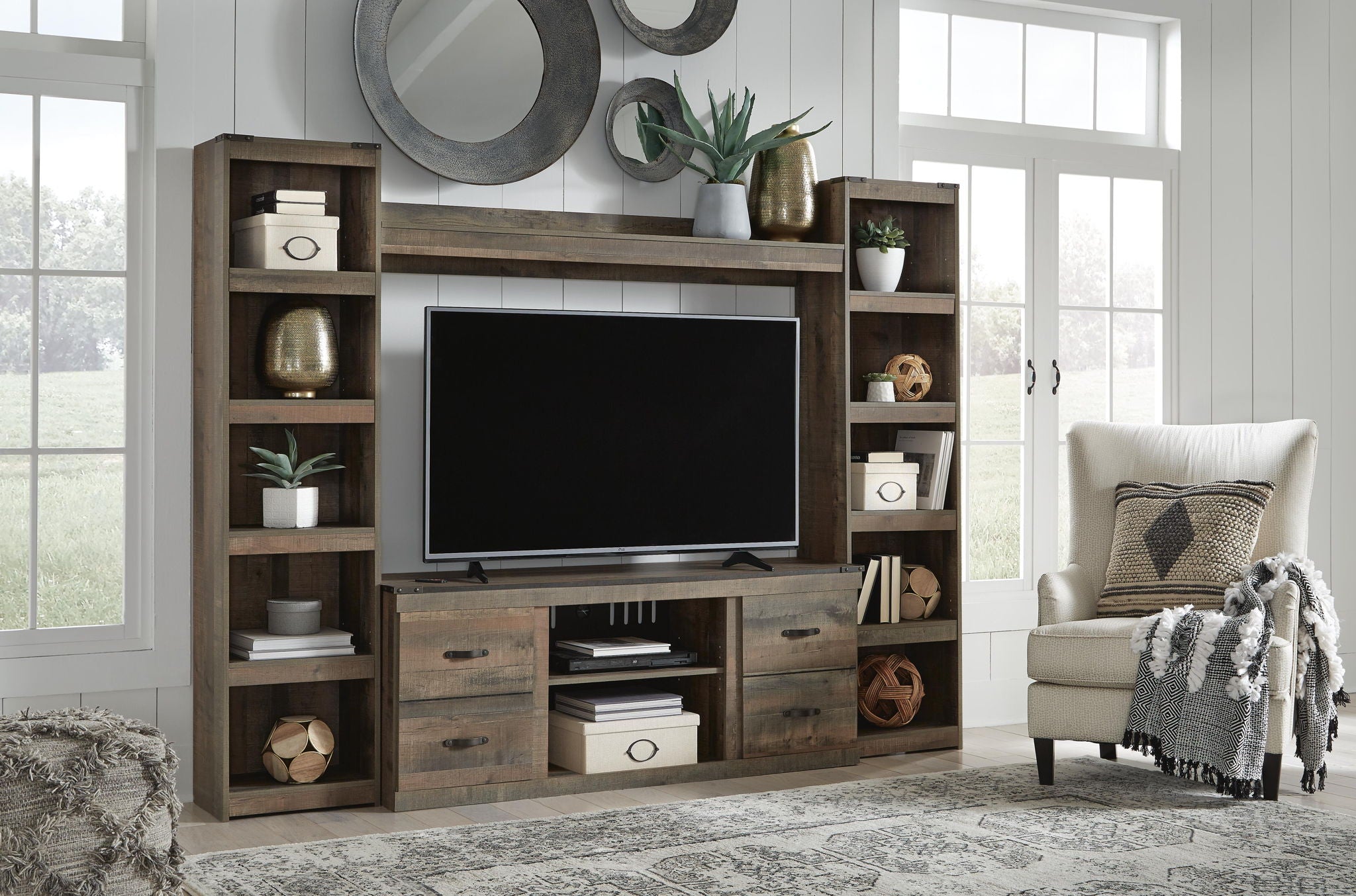 Dark brown media console with TV opening, open shelving and storage drawers