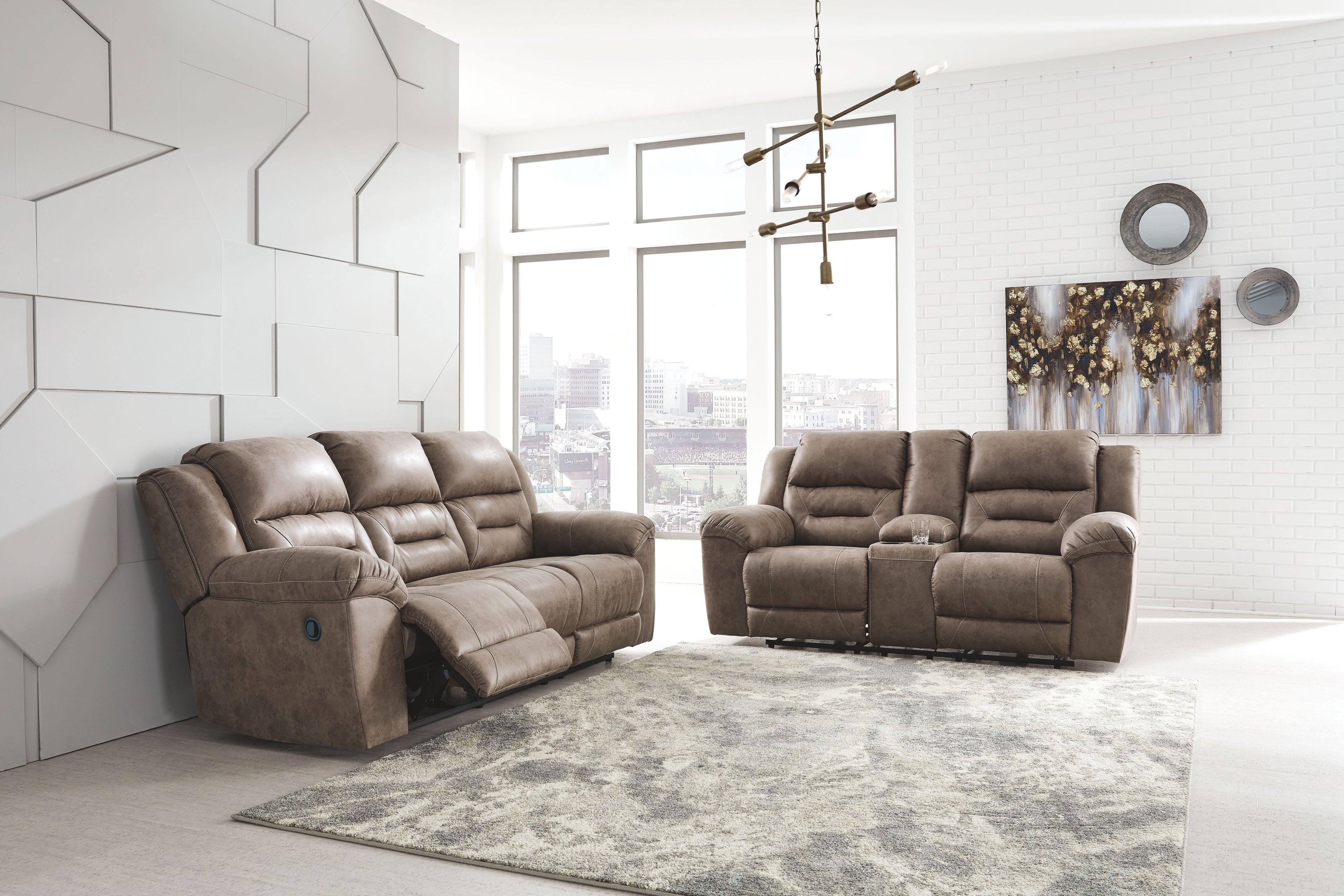 Reclining sofa and loveseat set in dark brown faux leather with padded headrests