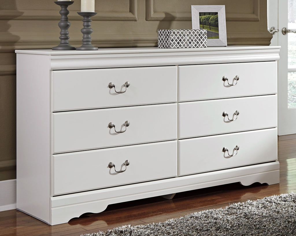 White dresser with mirror and six drawers, decorative knob pulls