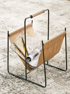 Brown magazine rack with black frame holding magazines and papers