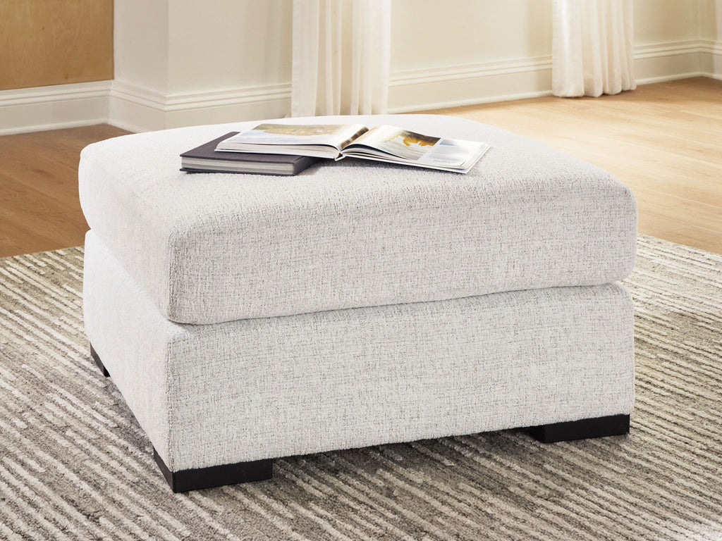 Oversized accent ottoman in chalk with cushioned lid and black base feet