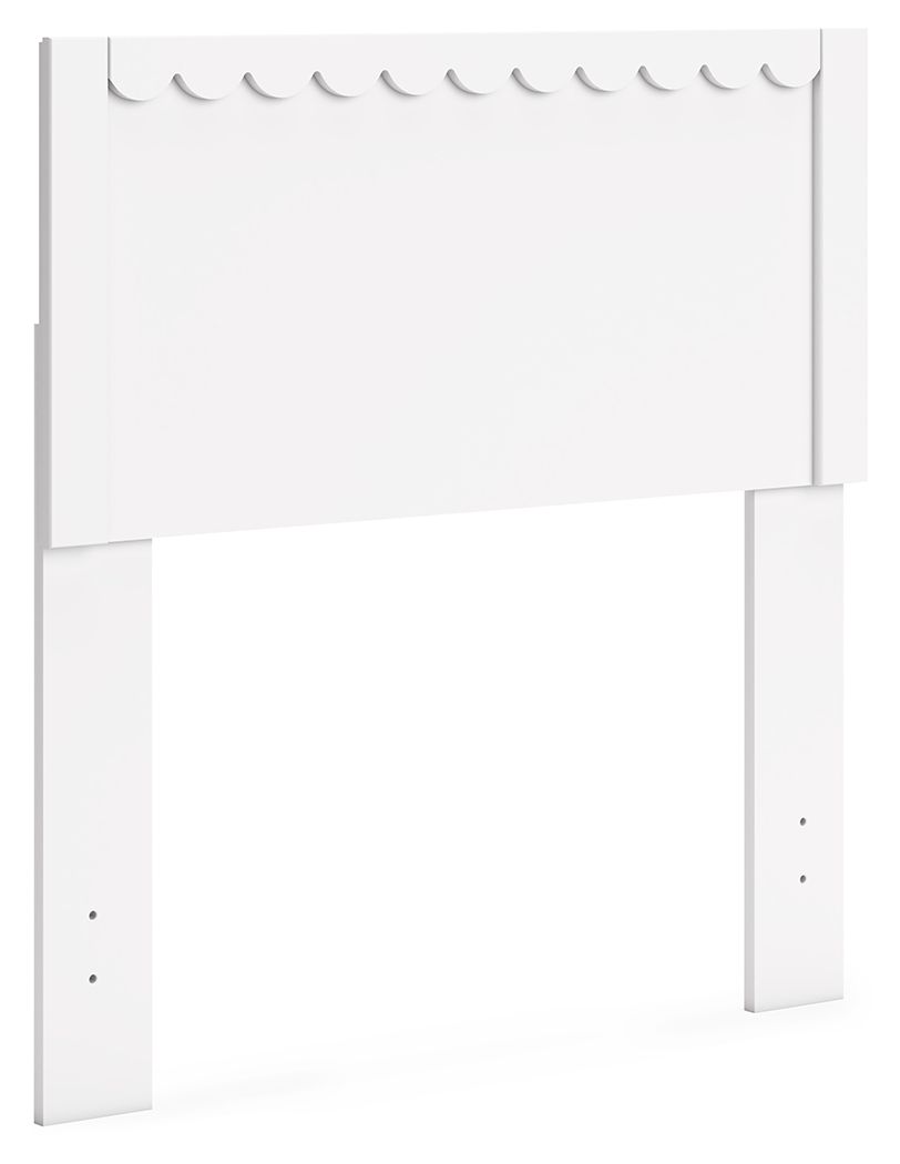 White panel headboard with scalloped top trim and wide rectangular backing