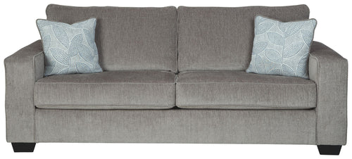Alloy sleeper sofa with two square patterned throw pillows and rolled armrests