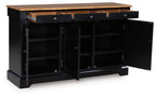 Dining room buffet cabinet with open black doors revealing shelves and drawers