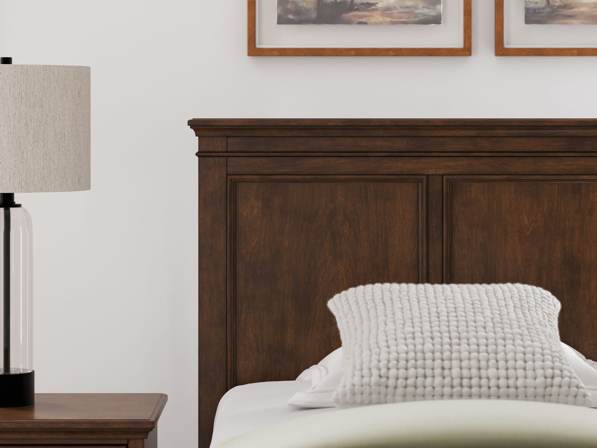 Brown twin panel headboard top with two recessed panels behind pillows