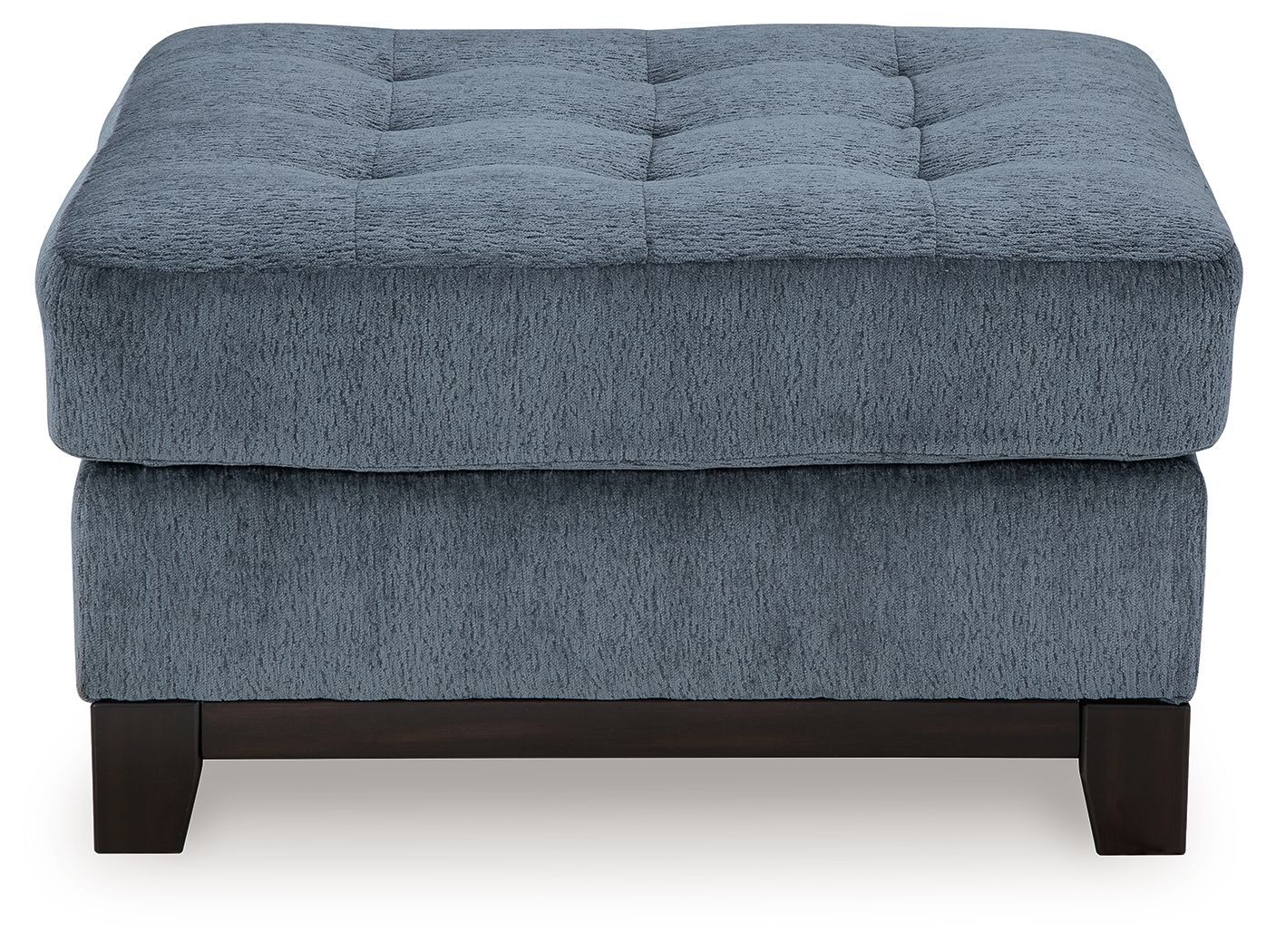 Blue oversized accent ottoman with tufted top and dark wooden legs