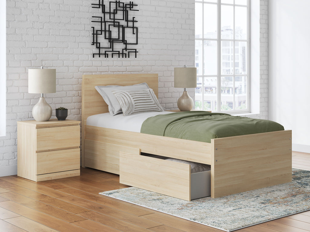 Light brown panel platform bed with slatted base and side storage drawers