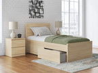 Light brown panel platform bed with slatted base and side storage drawers