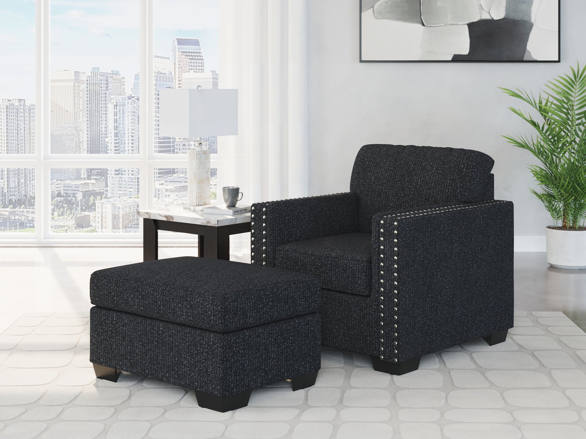 Black textured accent chair paired with matching ottoman