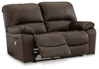 Power reclining loveseat, brown faux leather with curved arms and reclining footrest