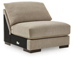 Beige upholstered armless chair with padded seat and dark wood legs