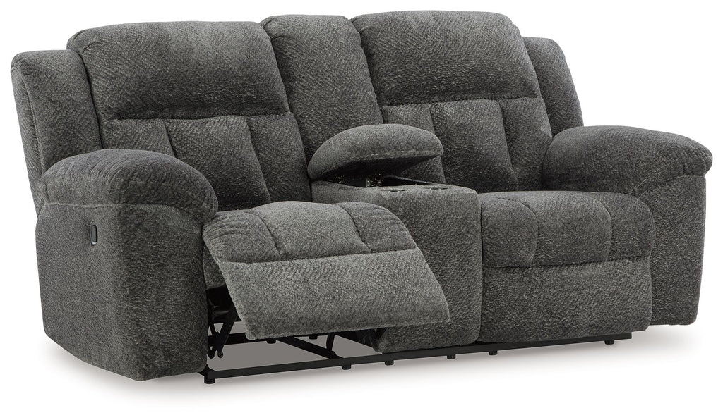 Dark gray double reclining loveseat with extended footrests and tufted seat cushions