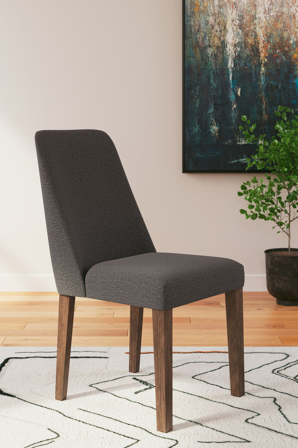 Upholstered dining chair with charcoal fabric and dark wood legs