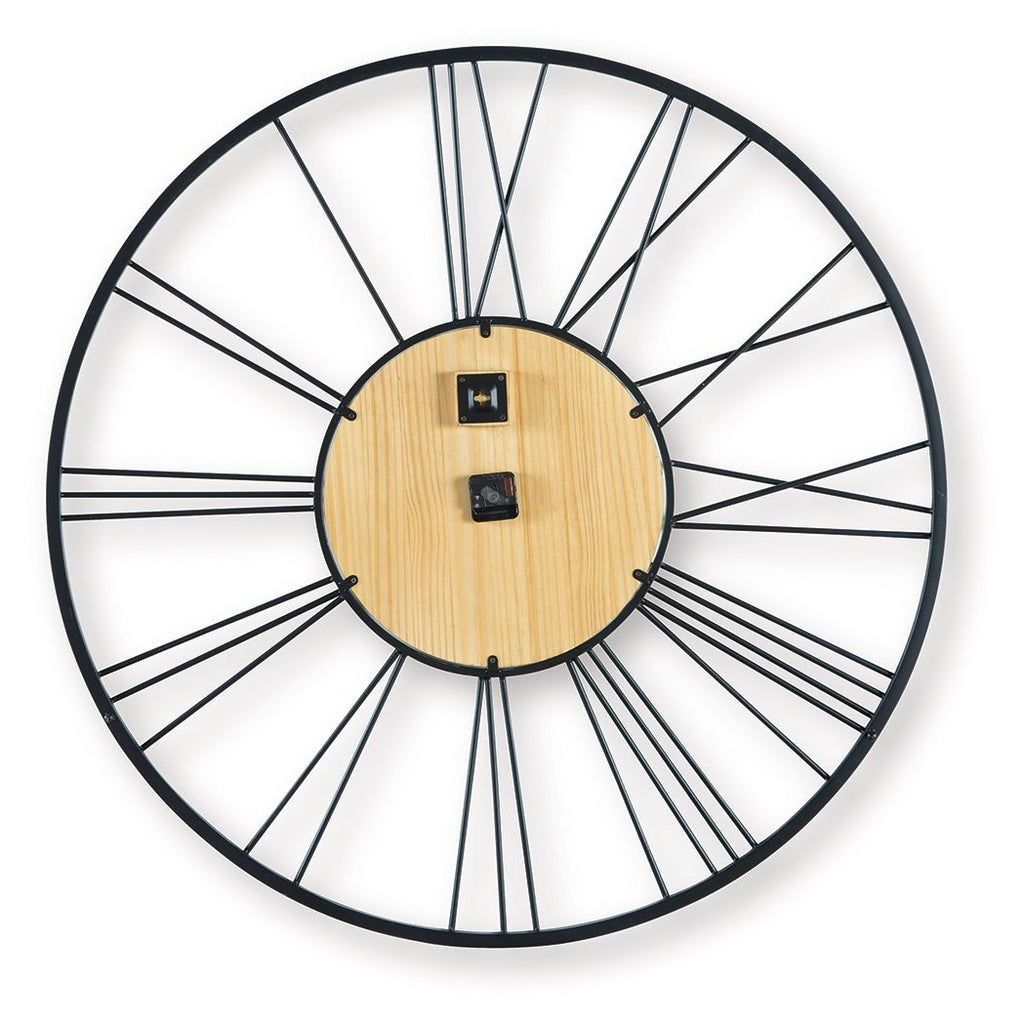 Round wall clock with wood face, black metal rim, and four black mounting pieces