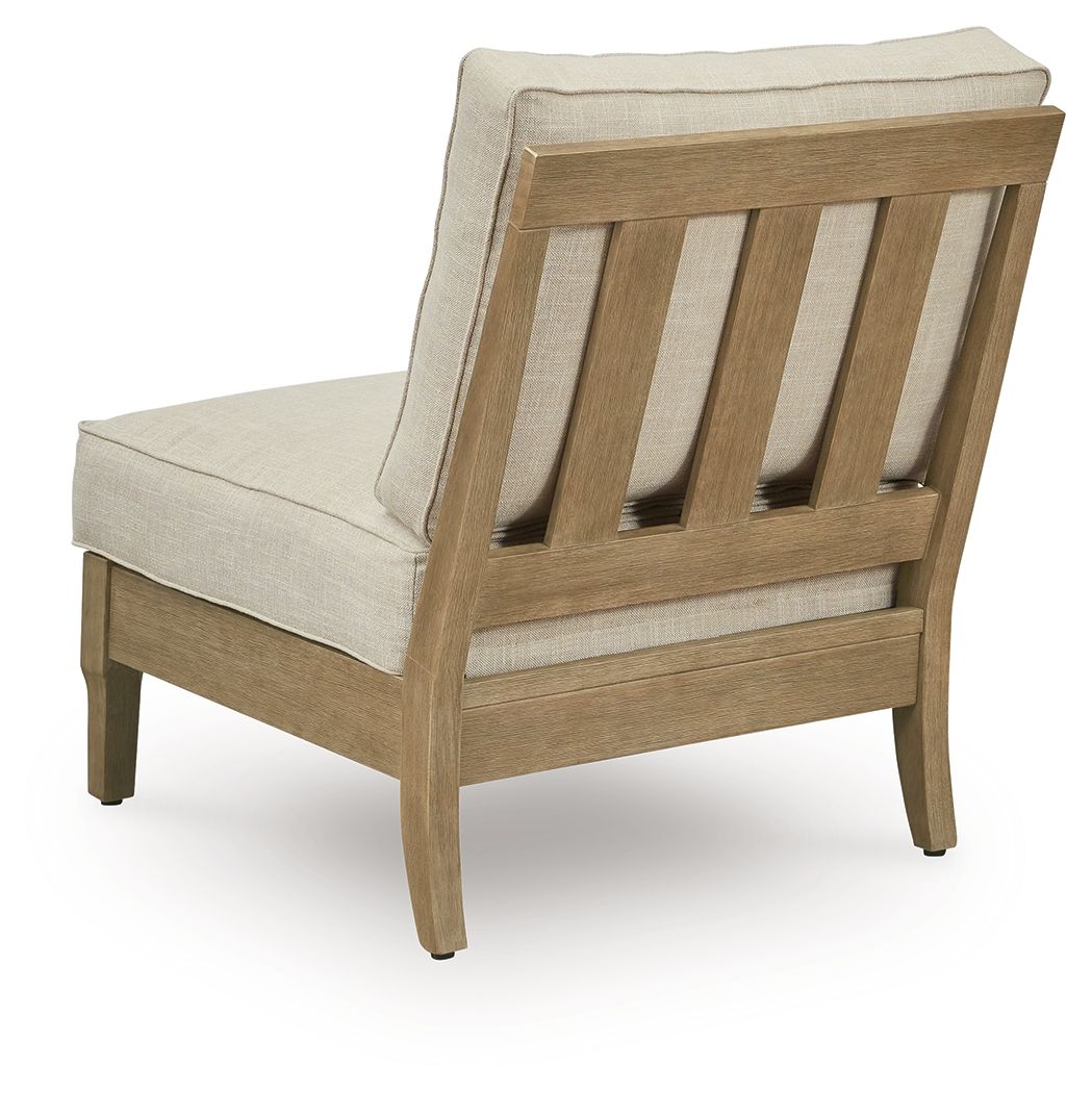 Beige armless accent chair with vertical slat wood back and padded seat cushion.