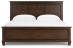 Dark brown panel bed with two drawers and three-panel headboard