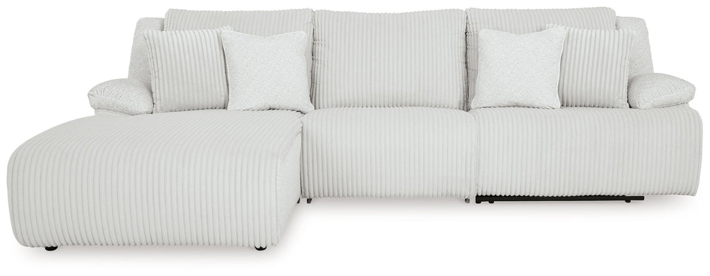 Light reclining sectional sofa with chaise-style seat and striped back pillows
