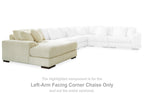 Ivory striped sectional chaise with left-facing arm and multiple back pillows