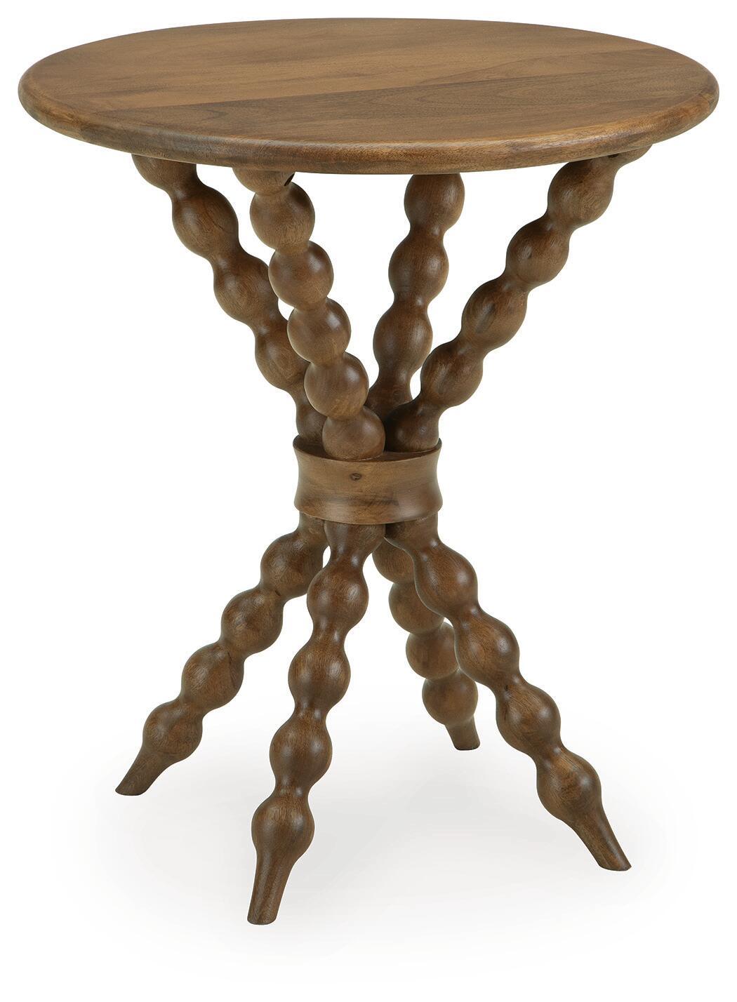Light brown round accent table with carved pedestal legs