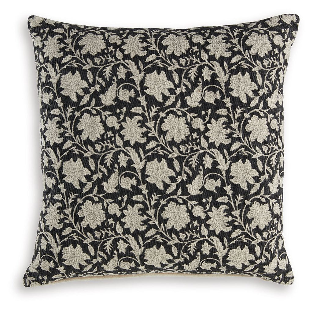 Black floral decorative pillow with beige vine and leaf pattern