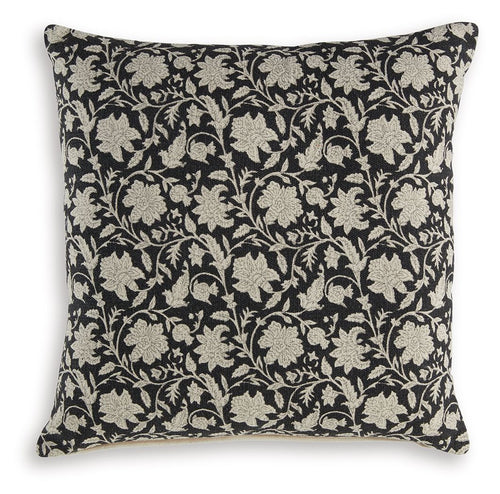 Black floral decorative pillow with beige vine and leaf pattern
