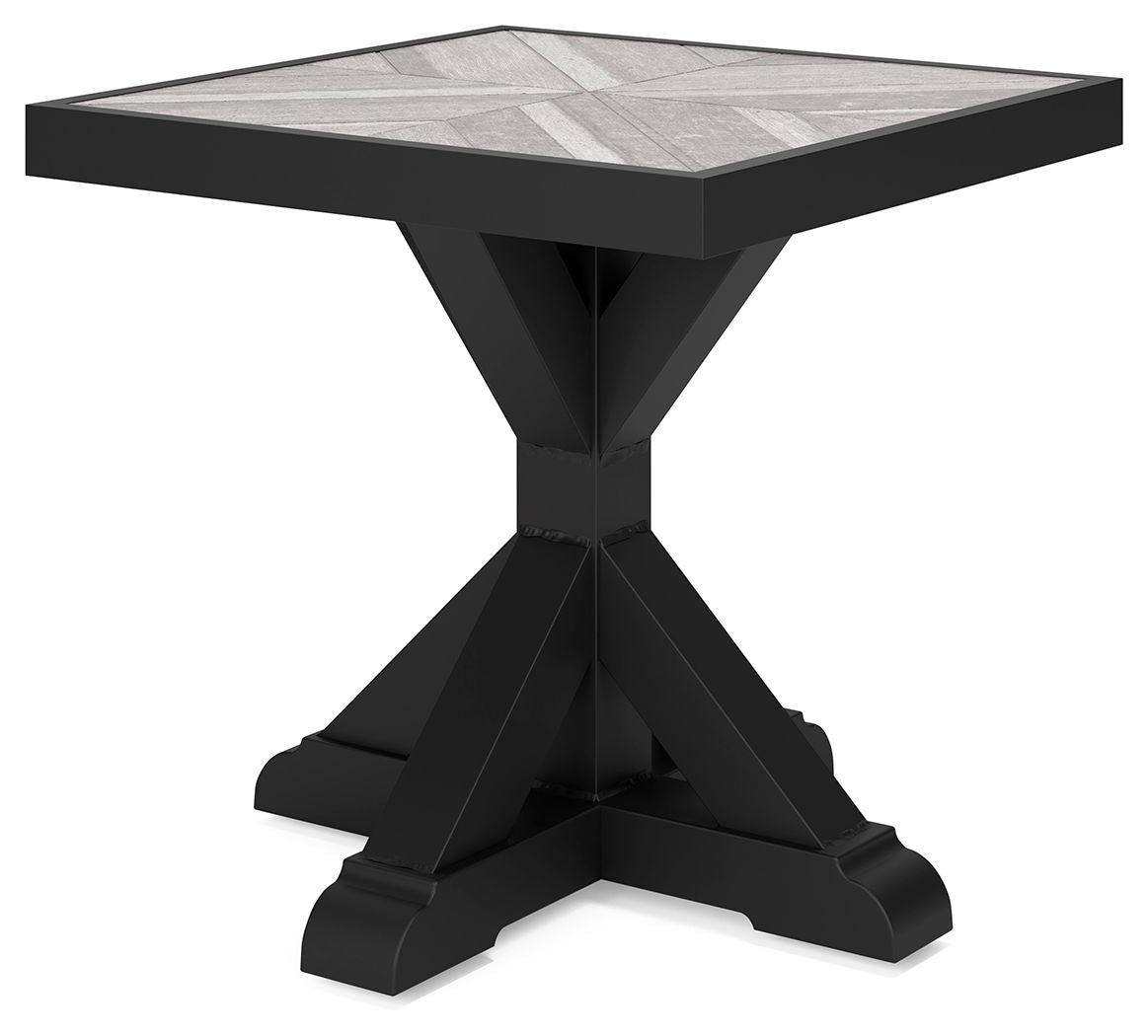 Black square end table with flat tabletop and sculpted X-leg base
