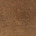 Cortnie light brown pillow fabric close-up with fine woven texture