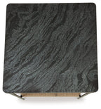 Dark textured tabletop corner with rounded edges and two visible support brackets
