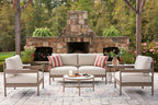 Beige outdoor seating set of 5 with loveseat, two lounge chairs, striped cushions, round table
