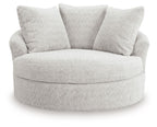 Swivel accent chair with curved round seat and three back cushions, light beige.