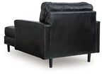 Onyx black leather chaise chair with thick arms, curved backrest, blocky legs