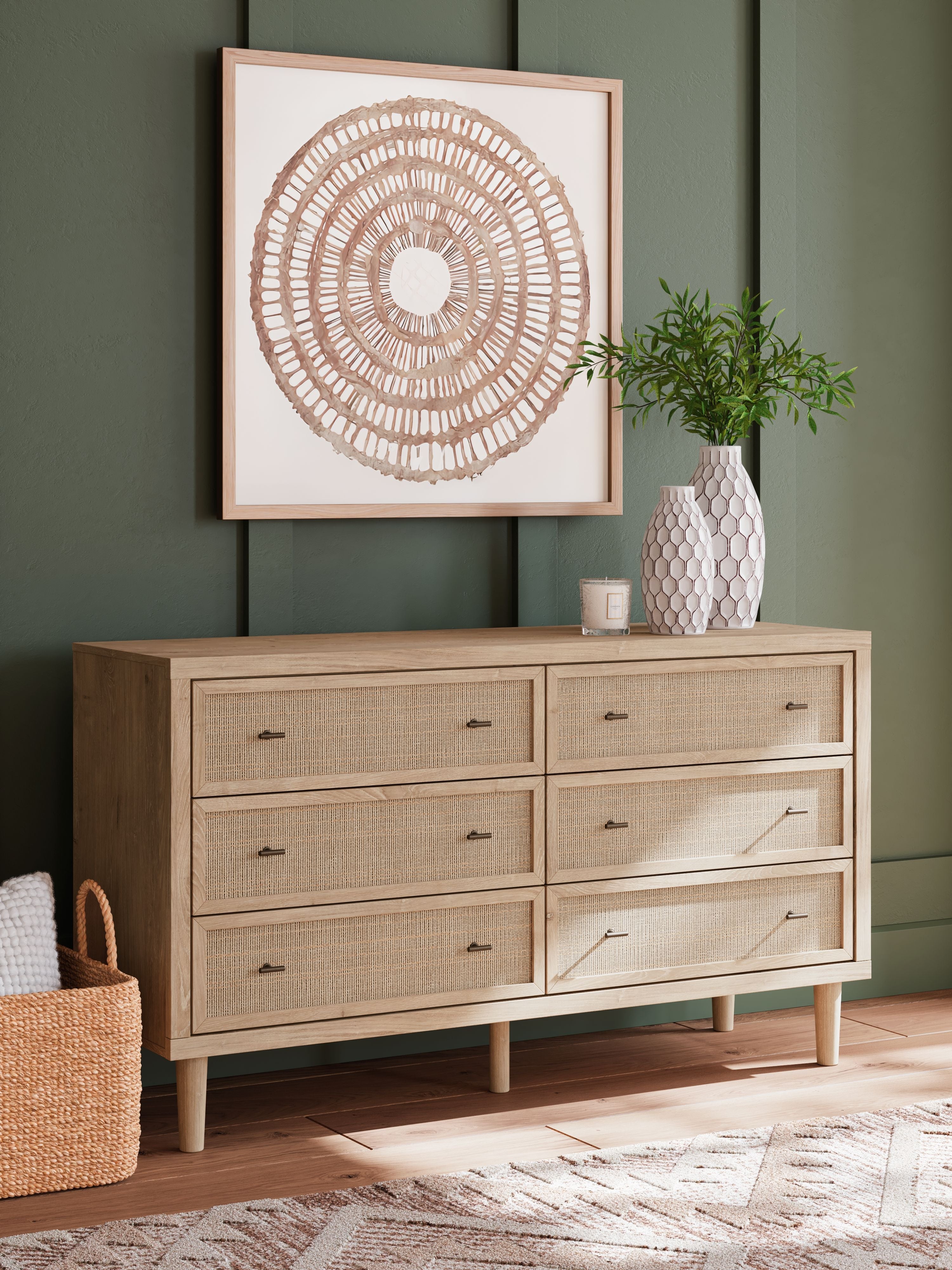 Two-tone six-drawer dresser with fabric drawer fronts, dark metal pulls, tapered wooden legs