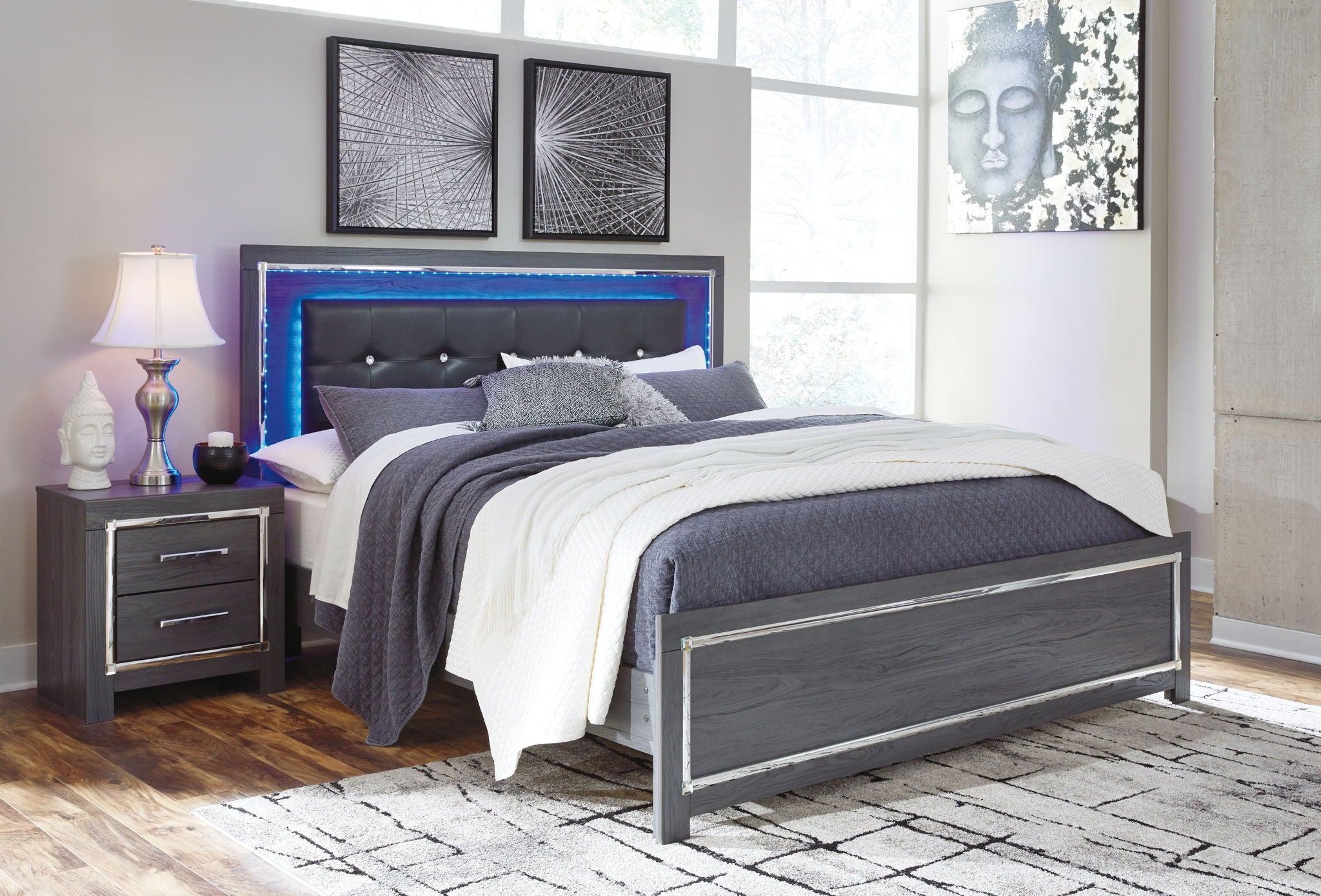 Gray panel bed with dark headboard and storage drawers, blue LED light behind headboard