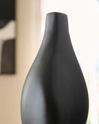 Black Judsen vase close-up showing rounded shoulders and narrow top opening.