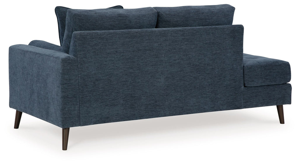 Blue corner chaise sofa with two back cushions and angled arm panels