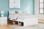 White platform bed with headboard, side storage drawers, and an open under-bed shelf