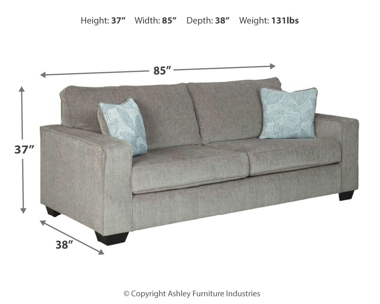 Slate stationary sofa side view with two light patterned throw pillows and angled arms
