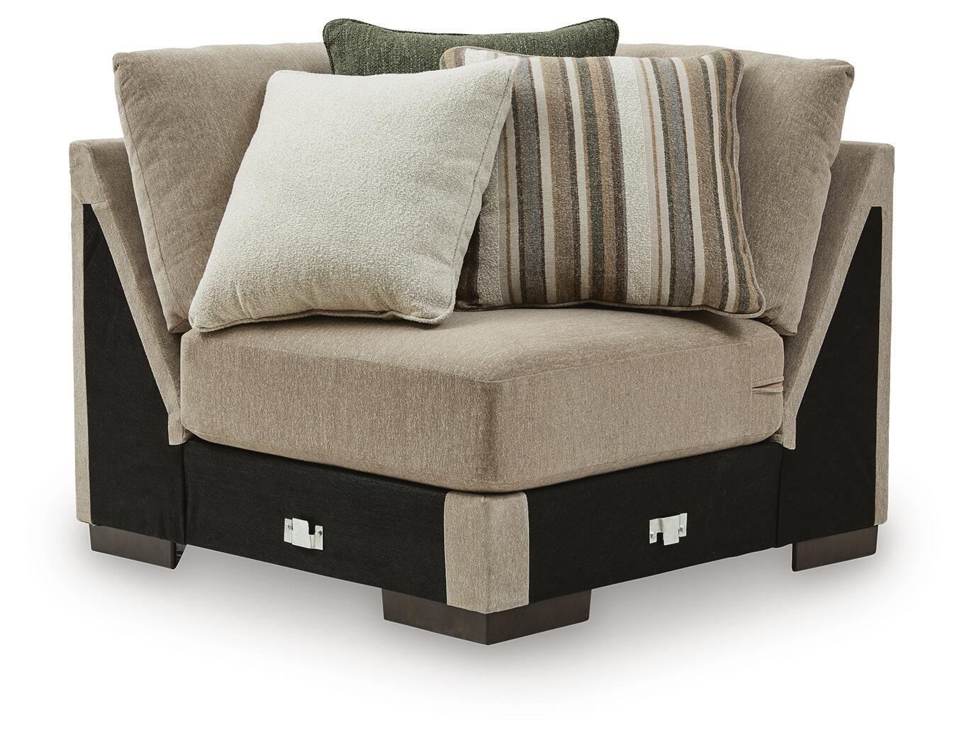 Fabric upholstered sectional wedge with two throw pillows in beige and striped accents