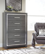 Gray five-drawer chest with metal bar pulls in front view